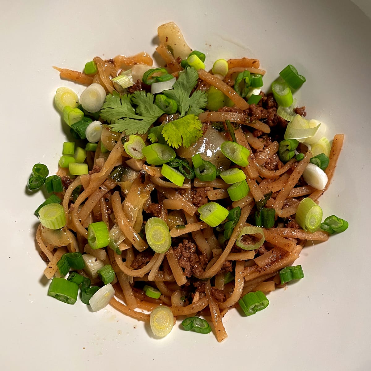 Dandan Inspired Ground Pork and Rice Noodles with Cabbage